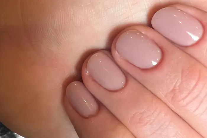 A close-up of a woman's nails.
